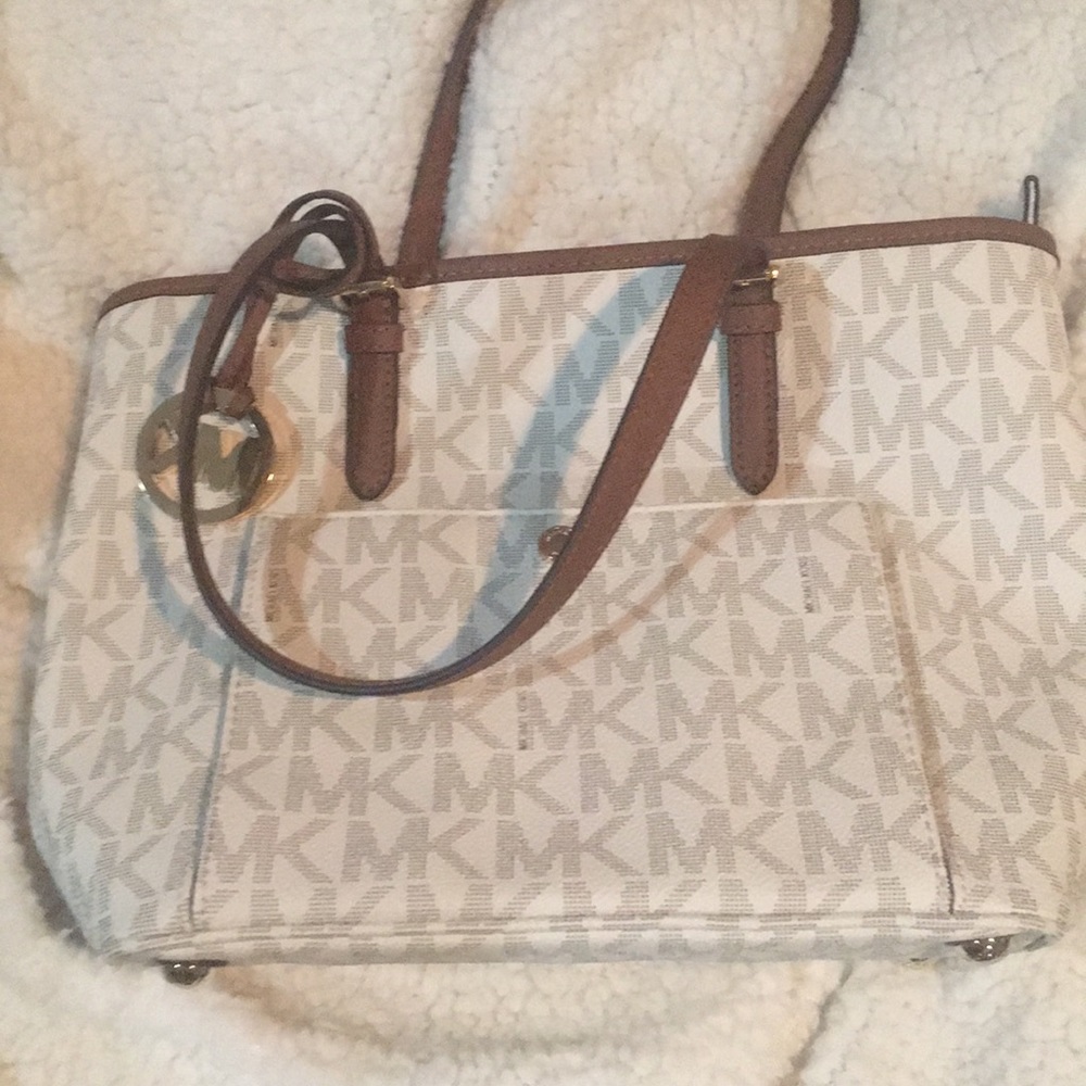 Brand new Michael Kors set. Open to trade-